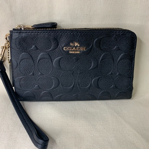 Coach Handbags - Coach Double Zip Wristlet Embossed C logo